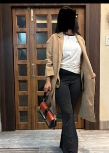 Elegant Tan Coat & Black Pants
