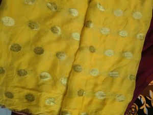 Elegant Yellow Saree with Gold Accents