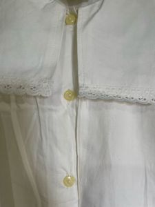 white top with collar