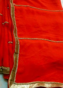 Orange Saree with Gold Dimond Patti Border