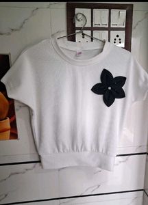 Girls Quilted t shirt with a black flower