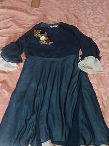 a gown with georgette fabric blue nd white colour