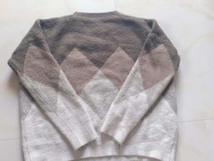 A Cropped Sweater Of Fabric Wool