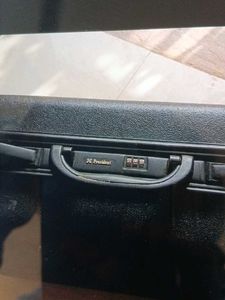 Black suitcase for tourism