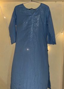 Blue Kurti With Silver Threads On It