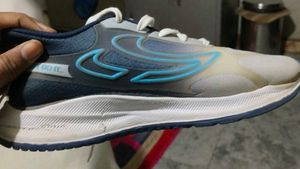 Used Blue Running Shoes