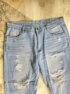 Ripped boyfriend fit denim