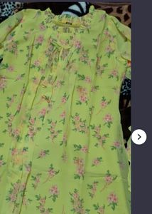 A flowing beautiful Yellow Color western dress