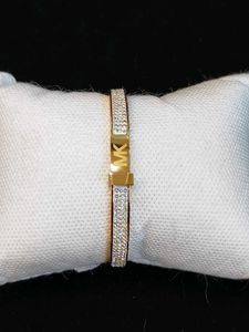 MICHAEL KORS GOLD PLATED WRISTWEAR