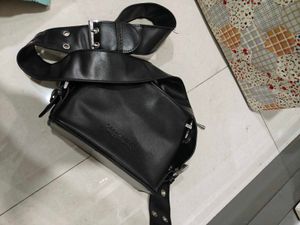 A Cute black Grungy Sling Bag