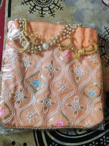 Embroidered Peach Potli Bag