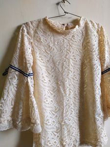 Top ,white cream in colour,