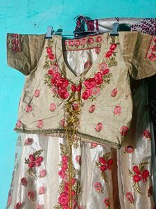 Beautiful golden and pink colour lahenga