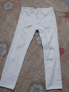 Distressed White Denim Jeans