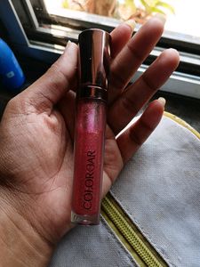 PINK COLOURED LIP GLOSS