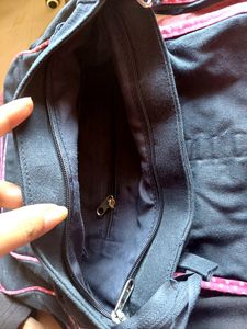 Pink And Blue Sling Bag