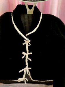 FUZZY BOW BLACK SWEATER