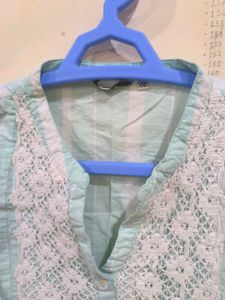 Blue and white striped kurti.