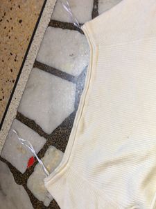 Cream Long Sleeve Top little bit damage in corner