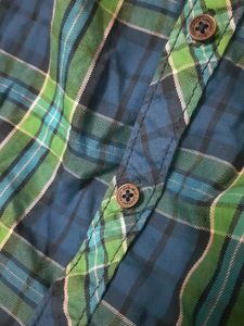 Stylish boys&#39; shirt with an attached hoodie.