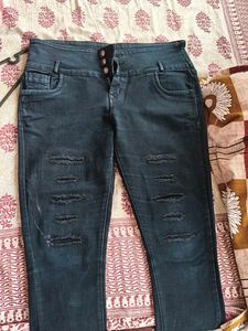 Ripped High-Waisted Jeans
