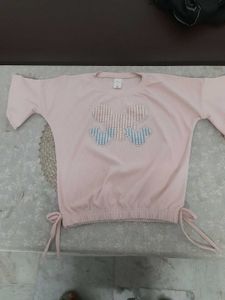 black jeans and like new dark peach top
