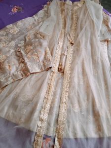 Lehenga With Net Full Sleeve Jacket And Blouse