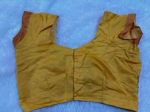 Mango Yellow With Red Colour Stitched Blouse
