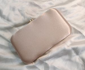 Clutch With Sling Chain And Handle