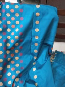 Uppada Pattu Teal Blue Saree with Gold Detail