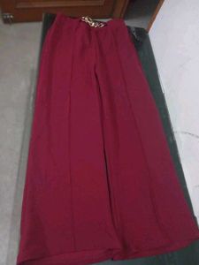 Maroon Wide-Leg Pants with Gold Chain Accent