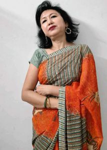Elegant Orange Printed Saree with Floral and Geome