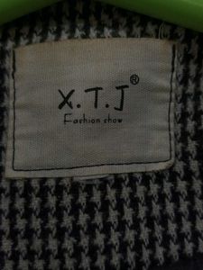 A Houndstooth Checkered Overcoat In Blended Wool.