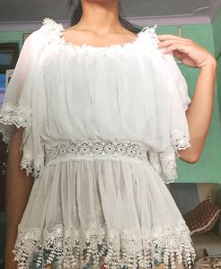 A Beautiful White Top Off Shoulder