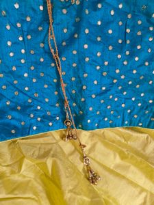 Lehengas with contrast choli and dual tone dupatta