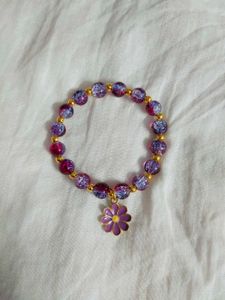 Red Beaded Bracelet with Flower Charm