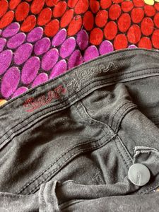“Burn” Branded Jeans