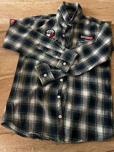 Boy&#39;s Plaid Button-Down Shirt With Jeans