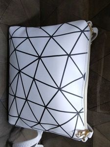 White Sling Bag.