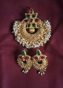 Rich Gold Jewellery Set Of One Detailed Worked Pendent With Two Royal Earings Completes Your Saree Look Perfectly