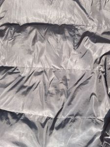 black oversized puffer jacket