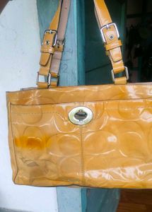 Coach Hampton mustard bag