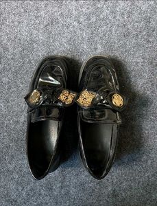 Black Loafers with Bow Detail