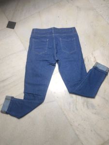 Distressed Blue Denim Jeans