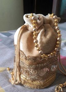 Elegant Gold Embellished Potli Bag