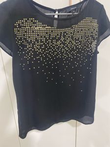Chic Black Blouse with Embellished Detail