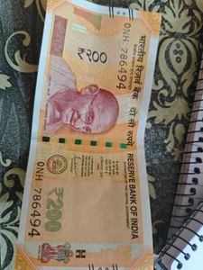 786- 200 rupees notes original