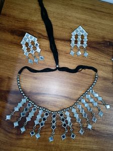 Two Pairs Of Necklace And Earrings