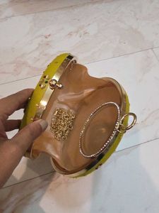 Mustard round Embroidered Clutch