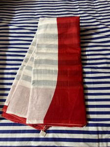 Striped Saree With White, Red And Black Colour